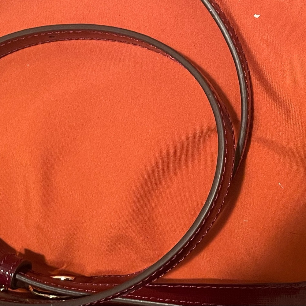 This is a used bag with a couple of scratches as shown. But good condition. - Picture 9 of 10
